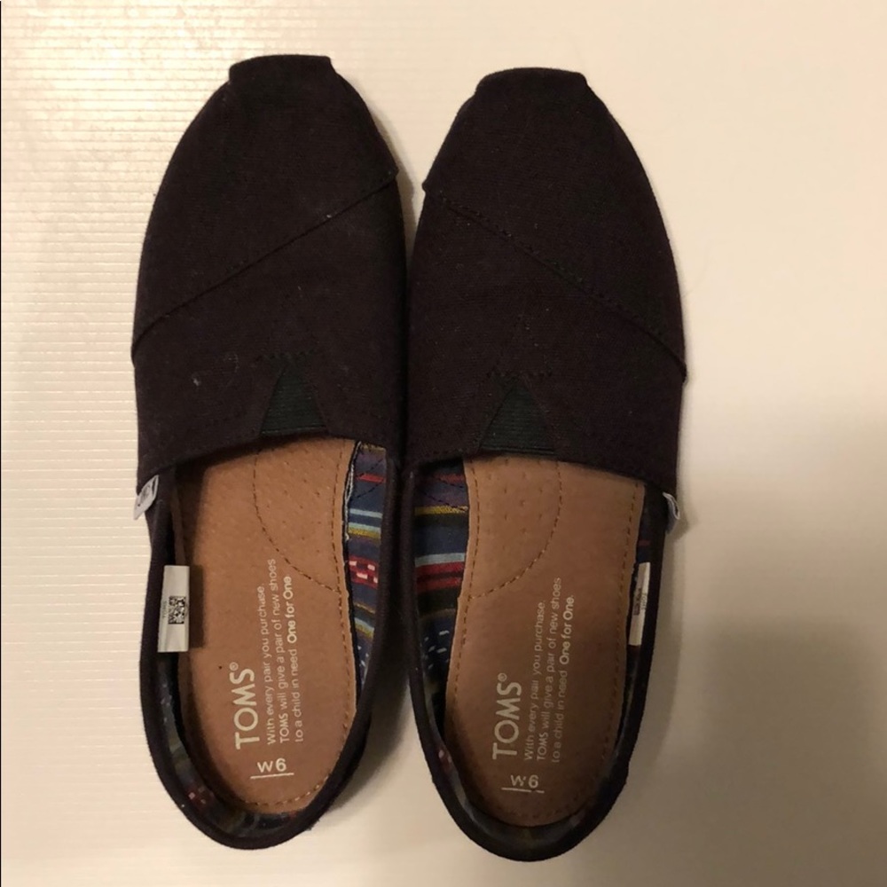 Black Toms Slip-Ons